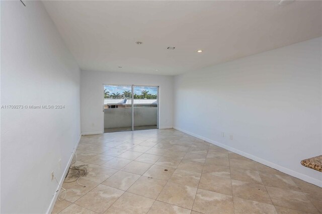 7410 SW 82nd St Unit K405, Miami, FL 33143 - spare room with recessed lighting and light tile patterned floors