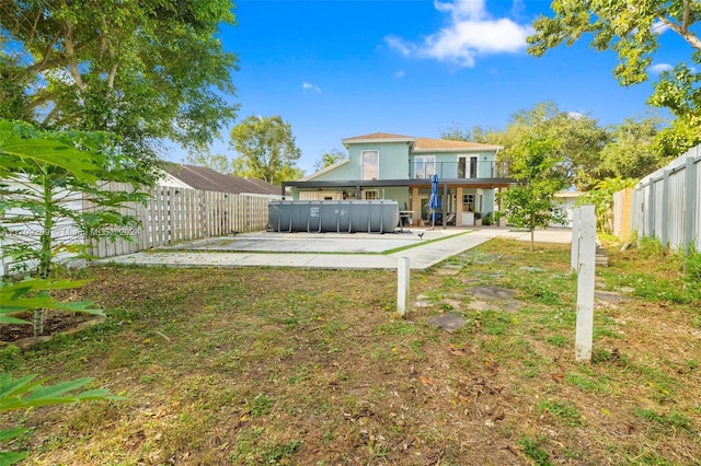 view of yard with a patio area