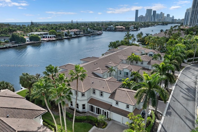 birds eye view of property featuring a water view