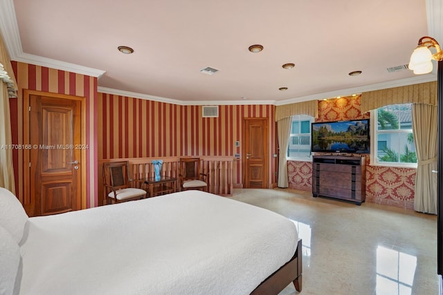 bedroom with ornamental molding