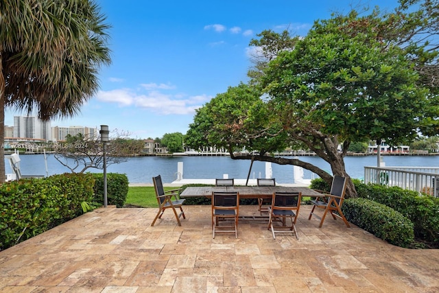 view of patio with a water view