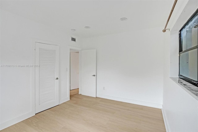 unfurnished bedroom with light hardwood / wood-style flooring