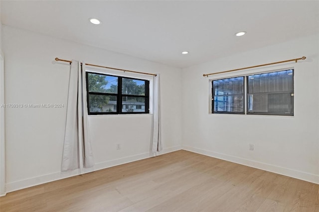 empty room featuring light hardwood / wood-style floors