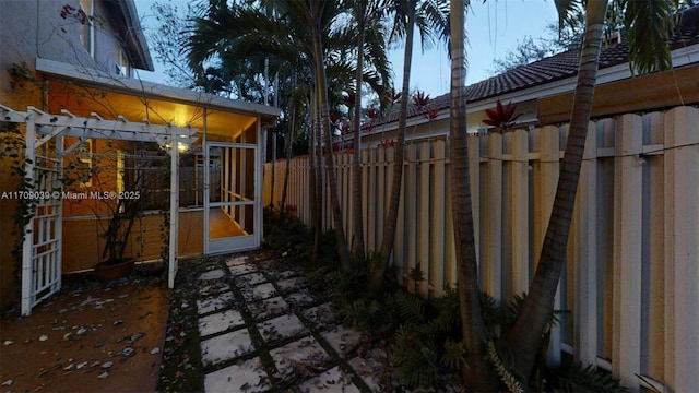 view of patio with french doors and a fenced backyard