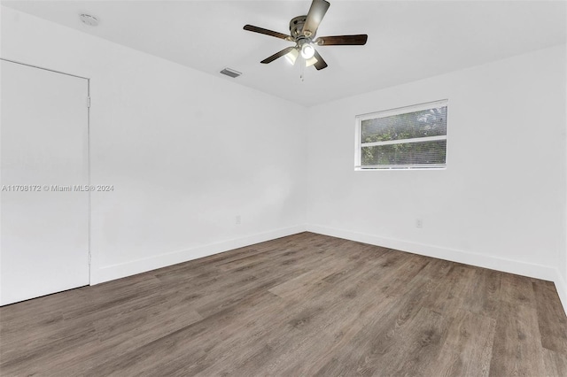 unfurnished room featuring hardwood / wood-style flooring and ceiling fan