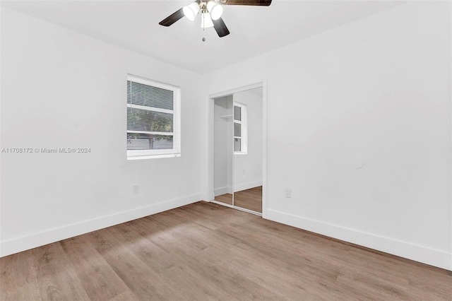 spare room featuring ceiling fan and light wood-type flooring