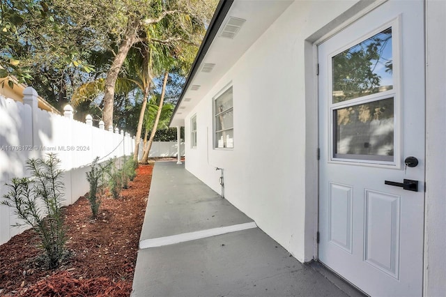 view of side of property featuring a patio