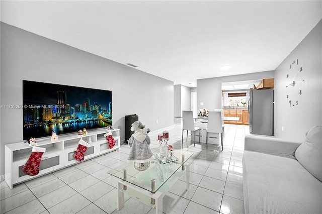 living room with light tile patterned floors