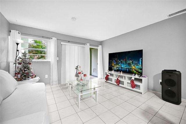 living room featuring light tile patterned floors