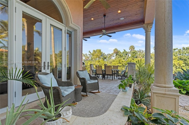 view of patio featuring french doors and ceiling fan