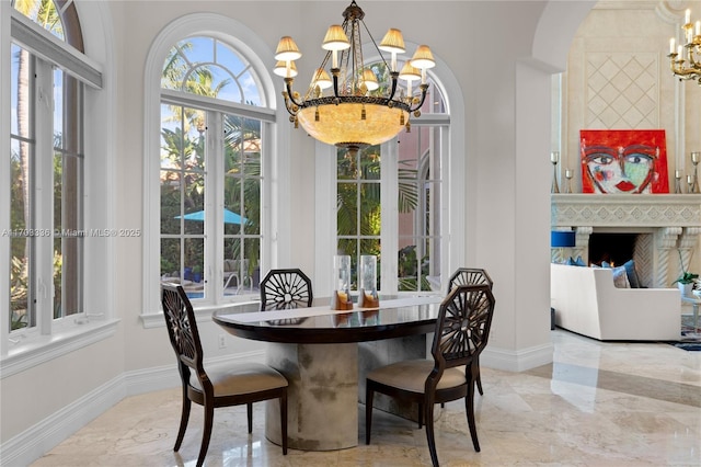 dining room featuring a notable chandelier