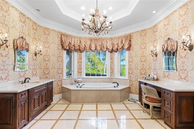 bathroom with vanity, a notable chandelier, and a bathtub