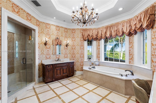 bathroom featuring a tray ceiling, ornamental molding, plus walk in shower, and vanity