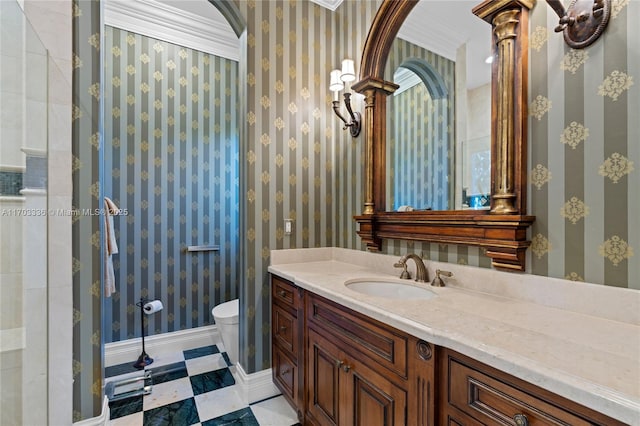 bathroom featuring vanity and toilet