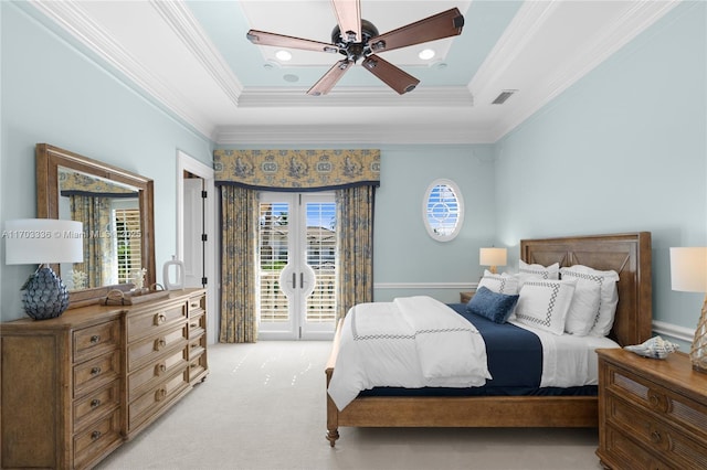 bedroom featuring access to exterior, ornamental molding, light colored carpet, and a raised ceiling