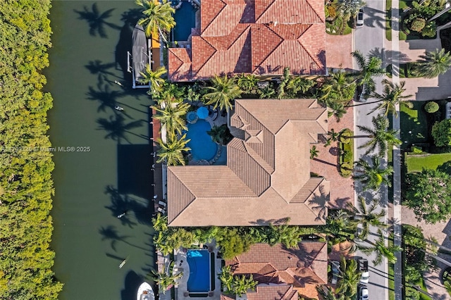 drone / aerial view featuring a water view