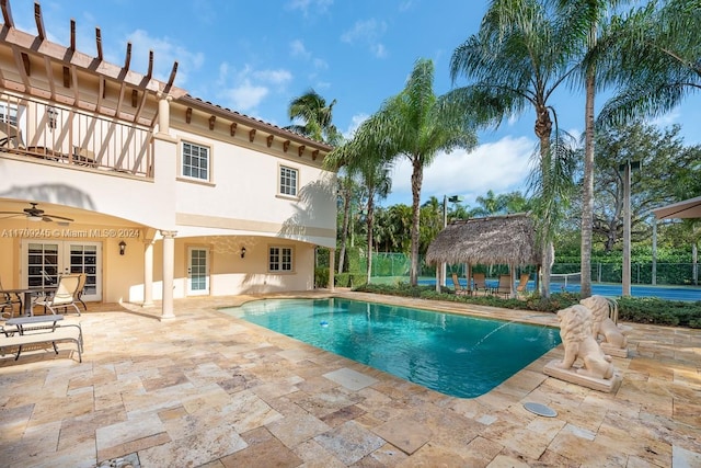 view of pool featuring a gazebo, a patio, and ceiling fan