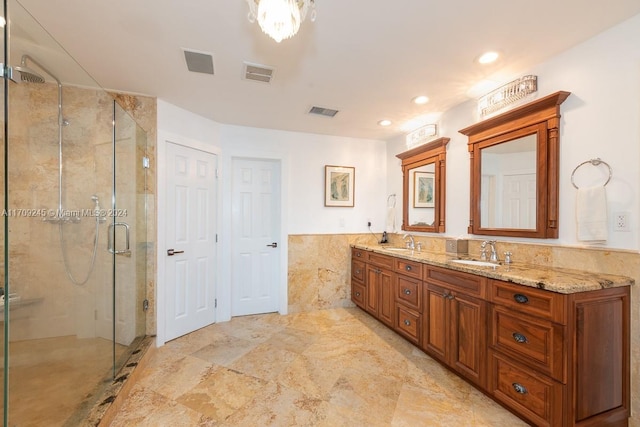 bathroom with vanity and walk in shower