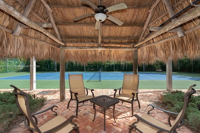 view of tennis court with ceiling fan