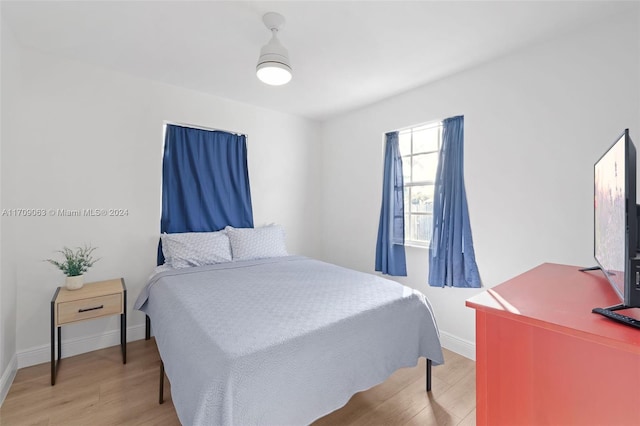 bedroom featuring wood-type flooring