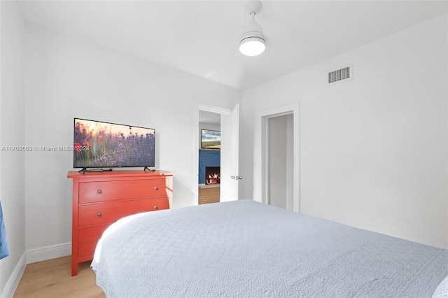 bedroom with light hardwood / wood-style flooring