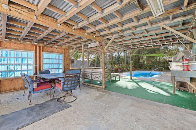 view of patio / terrace featuring a pool