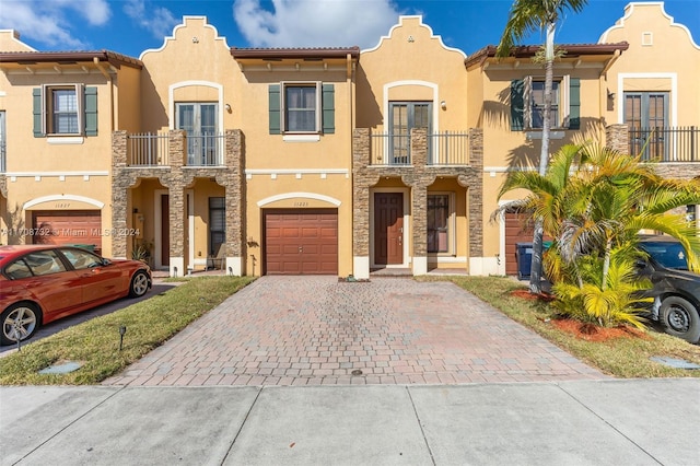 view of front of property with a balcony