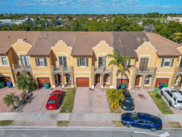 view of property with a balcony