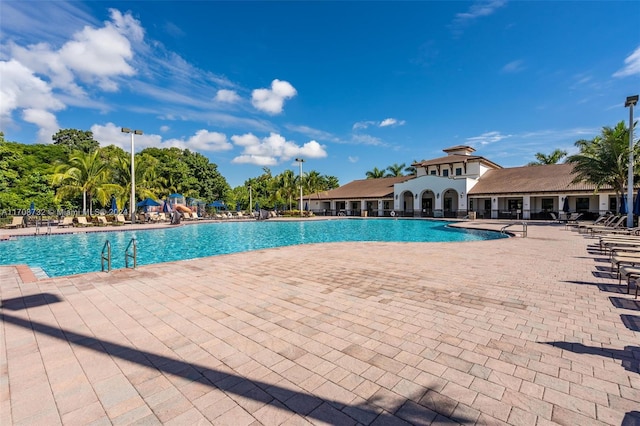 view of pool featuring a patio area