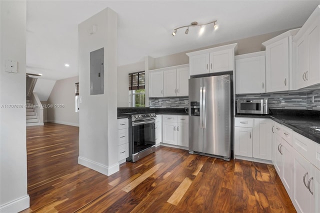 kitchen featuring white cabinetry, electric panel, and appliances with stainless steel finishes