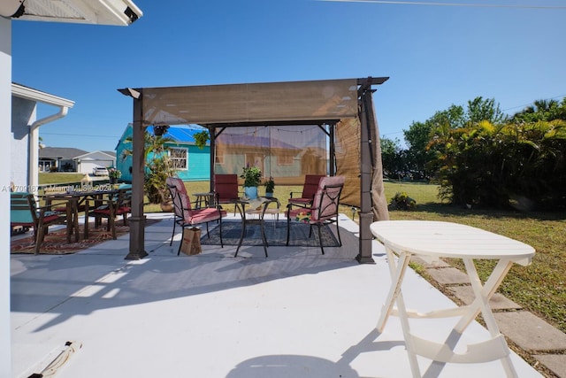 view of patio featuring a pergola