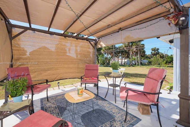 view of patio / terrace featuring a pergola