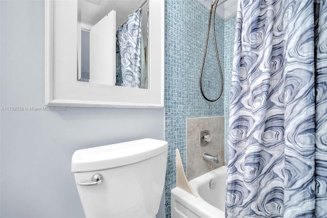 bathroom with shower / bathtub combination with curtain