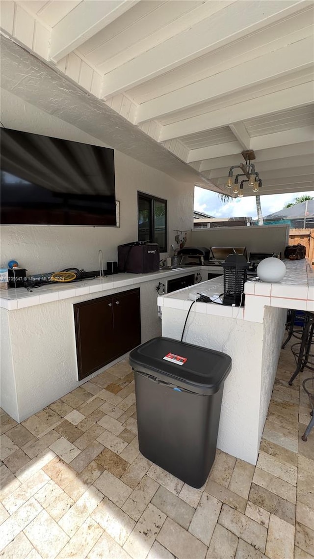 view of patio featuring exterior bar