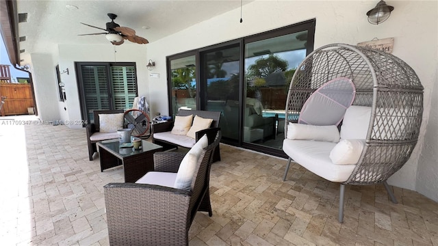 view of patio / terrace with ceiling fan and an outdoor hangout area