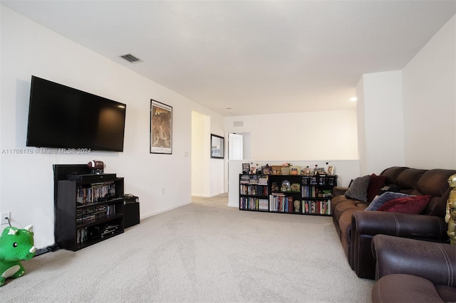 living room featuring light colored carpet