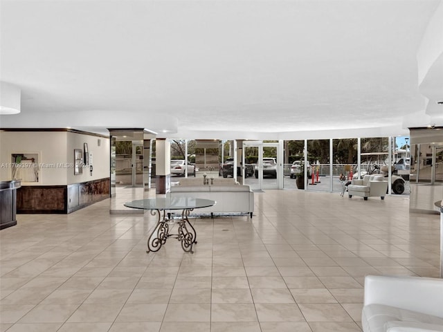 living room with light tile patterned floors