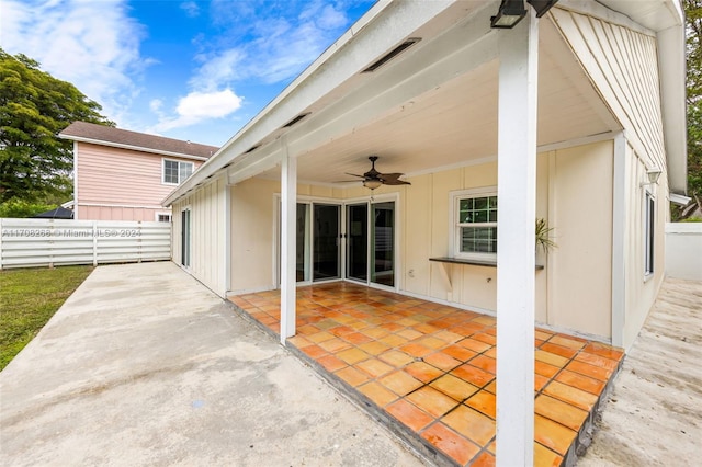 view of patio featuring ceiling fan