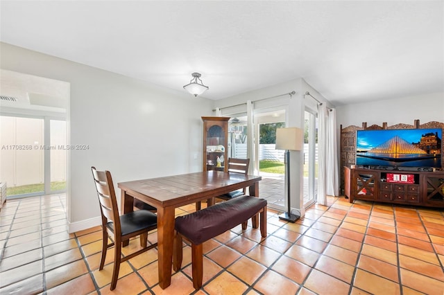 view of tiled dining area