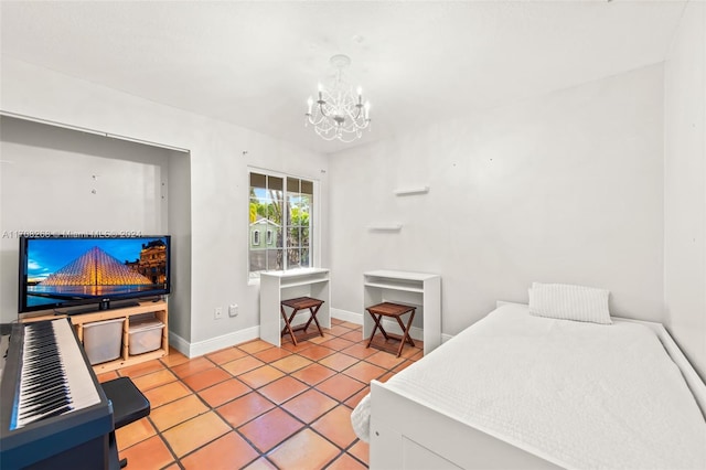 tiled bedroom featuring an inviting chandelier