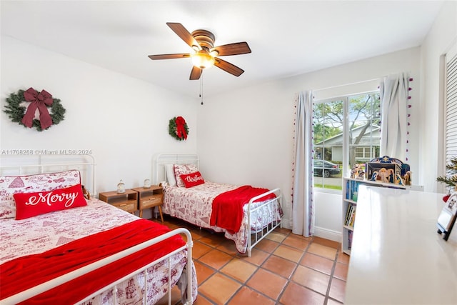 bedroom featuring tile patterned flooring and ceiling fan