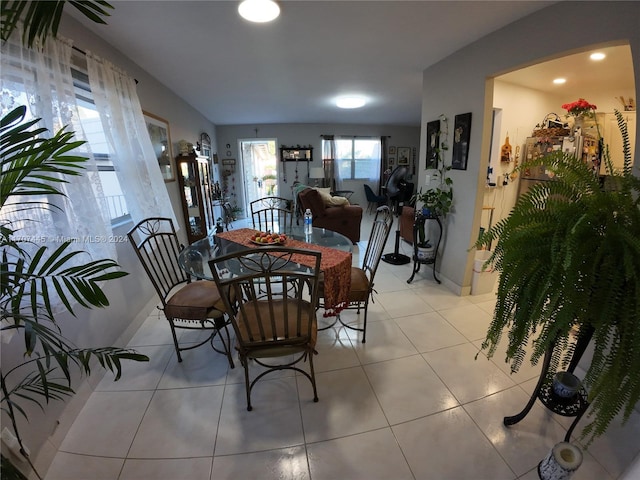 dining room with light tile patterned flooring