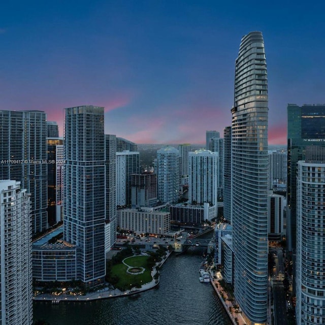 property's view of city with a water view