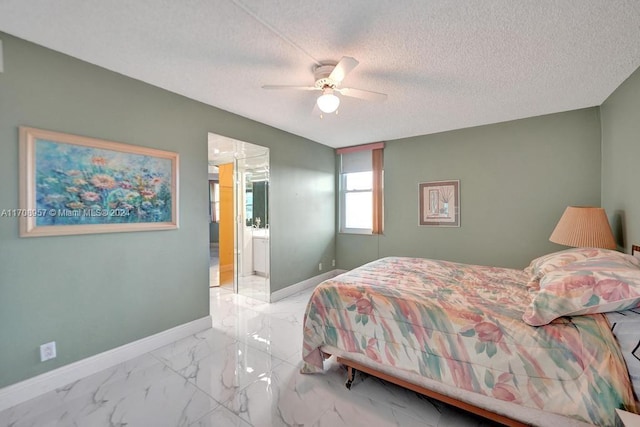 bedroom with connected bathroom, ceiling fan, and a textured ceiling