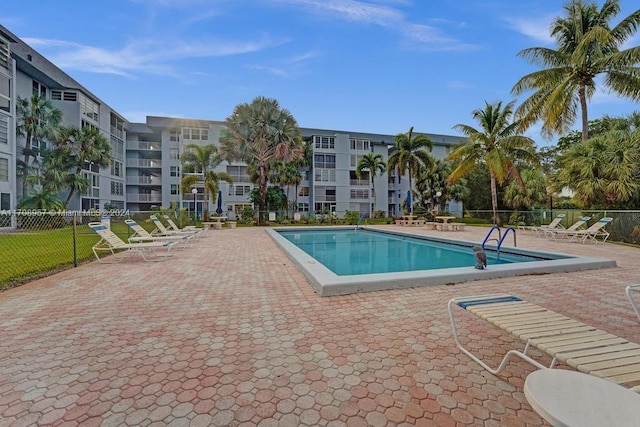 view of swimming pool with a patio area