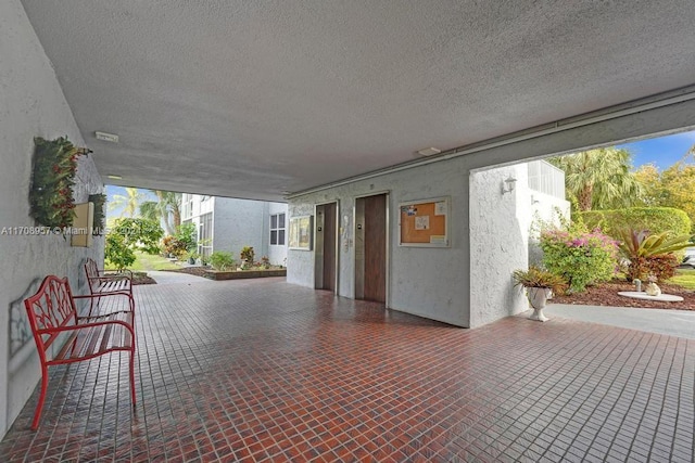 view of patio featuring elevator