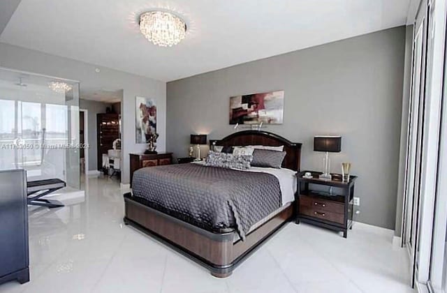 2020 N Bayshore Dr Unit 1008, Miami, FL 33137 - tiled bedroom with a chandelier and baseboards
