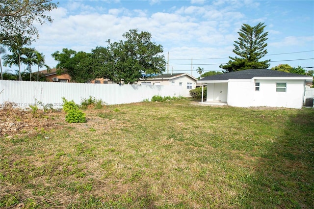 view of yard with central AC unit