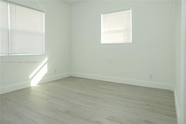 empty room with light wood-type flooring