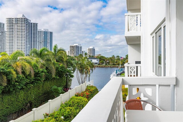 balcony featuring a water view